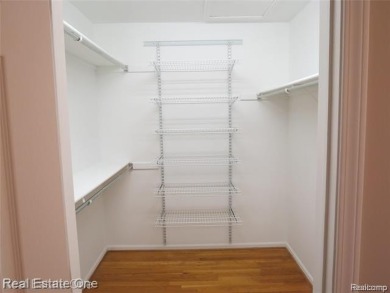 Welcome to this beautiful end unit condo in Country Club Village on Bushwood Golf Club in Michigan - for sale on GolfHomes.com, golf home, golf lot
