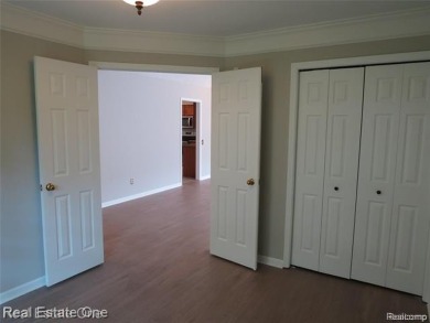 Welcome to this beautiful end unit condo in Country Club Village on Bushwood Golf Club in Michigan - for sale on GolfHomes.com, golf home, golf lot