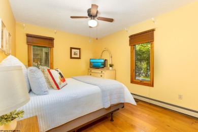 Welcome to 'Fireside'!  This lovely lake cottage nestled inside on Alpine Lake Resort in West Virginia - for sale on GolfHomes.com, golf home, golf lot