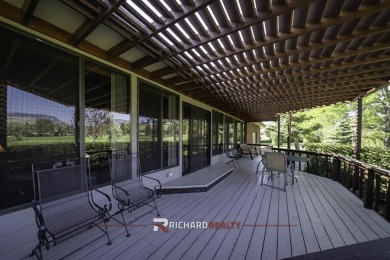 Step into this charming, expansive one-story brick home nestled on Olive Glenn Golf and Country Club in Wyoming - for sale on GolfHomes.com, golf home, golf lot