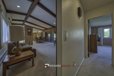 Step into this charming, expansive one-story brick home nestled on Olive Glenn Golf and Country Club in Wyoming - for sale on GolfHomes.com, golf home, golf lot