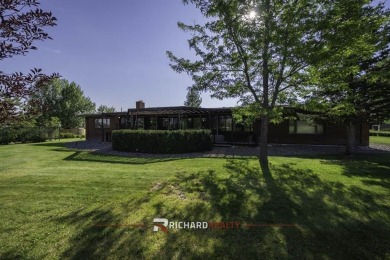 Step into this charming, expansive one-story brick home nestled on Olive Glenn Golf and Country Club in Wyoming - for sale on GolfHomes.com, golf home, golf lot