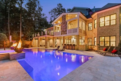 Experience luxury living in this stunning executive home located on MacGregor Downs Country Club in North Carolina - for sale on GolfHomes.com, golf home, golf lot