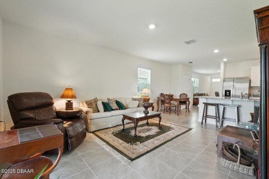 Discover the exceptional value of this pristine 2023 DR Horton on Halifax Plantation Golf Club in Florida - for sale on GolfHomes.com, golf home, golf lot
