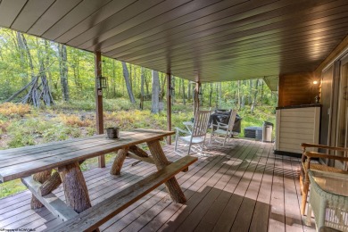 Welcome to 'Fireside'!  This lovely lake cottage nestled inside on Alpine Lake Resort in West Virginia - for sale on GolfHomes.com, golf home, golf lot