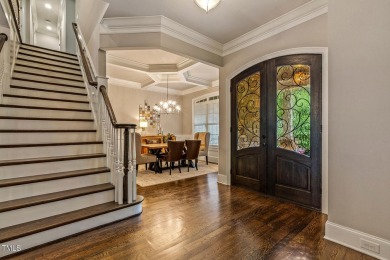 Experience luxury living in this stunning executive home located on MacGregor Downs Country Club in North Carolina - for sale on GolfHomes.com, golf home, golf lot