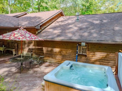 Welcome to 'Fireside'!  This lovely lake cottage nestled inside on Alpine Lake Resort in West Virginia - for sale on GolfHomes.com, golf home, golf lot