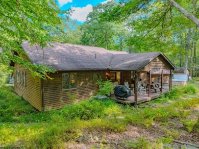 Welcome to 'Fireside'!  This lovely lake cottage nestled inside on Alpine Lake Resort in West Virginia - for sale on GolfHomes.com, golf home, golf lot