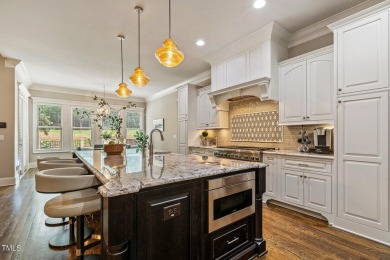 Experience luxury living in this stunning executive home located on MacGregor Downs Country Club in North Carolina - for sale on GolfHomes.com, golf home, golf lot