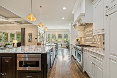 Experience luxury living in this stunning executive home located on MacGregor Downs Country Club in North Carolina - for sale on GolfHomes.com, golf home, golf lot