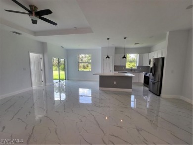 Beautiful New Construction ... Across the street from Coral Oaks on Burnt Store Golf Club in Florida - for sale on GolfHomes.com, golf home, golf lot