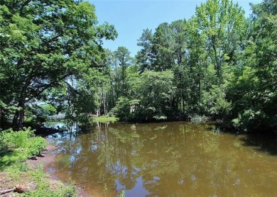 This lot is located in the fantastic community of Indian Creek on Indian Creek Yacht and Country Club in Virginia - for sale on GolfHomes.com, golf home, golf lot