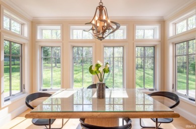 This exceptional luxury residence blends timeless elegance and on The Eagle Pointe Golf Resort in Indiana - for sale on GolfHomes.com, golf home, golf lot