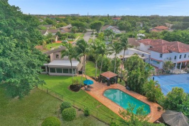 Unforgettable 5-bed, 3-bath gem at the end of a quiet cul-de-sac on Jacaranda Golf Club in Florida - for sale on GolfHomes.com, golf home, golf lot