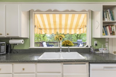 Situated directly across from the tranquil fairways of the on Lookout Mountain Golf Club in Georgia - for sale on GolfHomes.com, golf home, golf lot