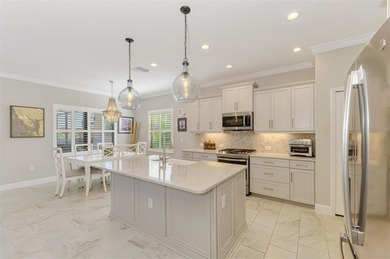 Some homes project confidence the moment you pull up. This one on Boca Royale Golf and Country Club in Florida - for sale on GolfHomes.com, golf home, golf lot