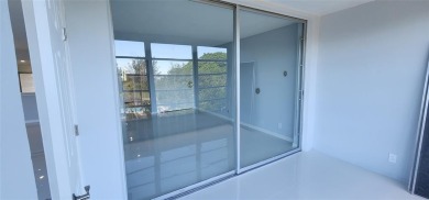 Spacious Remodel VERY BRIGHT Golf and Pool view. NEW A/C on Palm-Aire Country Club and Resort - The Oaks in Florida - for sale on GolfHomes.com, golf home, golf lot