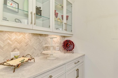 Some homes project confidence the moment you pull up. This one on Boca Royale Golf and Country Club in Florida - for sale on GolfHomes.com, golf home, golf lot