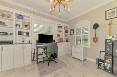 Some homes project confidence the moment you pull up. This one on Boca Royale Golf and Country Club in Florida - for sale on GolfHomes.com, golf home, golf lot