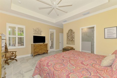 Some homes project confidence the moment you pull up. This one on Boca Royale Golf and Country Club in Florida - for sale on GolfHomes.com, golf home, golf lot