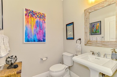 Some homes project confidence the moment you pull up. This one on Boca Royale Golf and Country Club in Florida - for sale on GolfHomes.com, golf home, golf lot