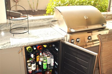 Some homes project confidence the moment you pull up. This one on Boca Royale Golf and Country Club in Florida - for sale on GolfHomes.com, golf home, golf lot