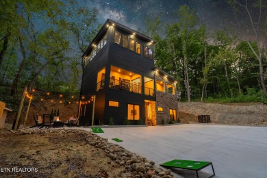 Discover a one-of-a-kind luxury retreat in the heart of Pigeon on Gatlinburg Golf Course in Tennessee - for sale on GolfHomes.com, golf home, golf lot