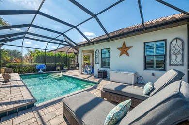 Some homes project confidence the moment you pull up. This one on Boca Royale Golf and Country Club in Florida - for sale on GolfHomes.com, golf home, golf lot