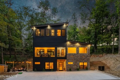 Discover a one-of-a-kind luxury retreat in the heart of Pigeon on Gatlinburg Golf Course in Tennessee - for sale on GolfHomes.com, golf home, golf lot