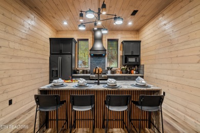 Discover a one-of-a-kind luxury retreat in the heart of Pigeon on Gatlinburg Golf Course in Tennessee - for sale on GolfHomes.com, golf home, golf lot