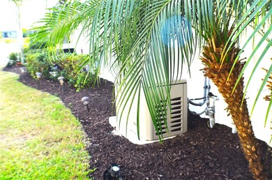 Some homes project confidence the moment you pull up. This one on Boca Royale Golf and Country Club in Florida - for sale on GolfHomes.com, golf home, golf lot