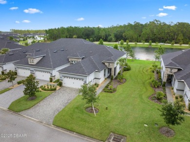Enjoy Sunrise on your lanai with a fantastic water view! Classic on Plantation Bay Golf and Country Club in Florida - for sale on GolfHomes.com, golf home, golf lot