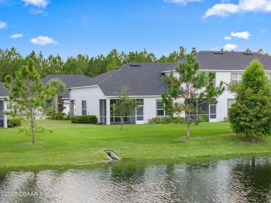 Enjoy Sunrise on your lanai with a fantastic water view! Classic on Plantation Bay Golf and Country Club in Florida - for sale on GolfHomes.com, golf home, golf lot