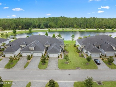 Enjoy Sunrise on your lanai with a fantastic water view! Classic on Plantation Bay Golf and Country Club in Florida - for sale on GolfHomes.com, golf home, golf lot