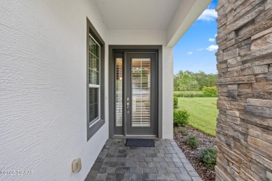 Enjoy Sunrise on your lanai with a fantastic water view! Classic on Plantation Bay Golf and Country Club in Florida - for sale on GolfHomes.com, golf home, golf lot