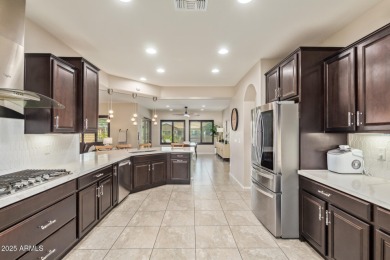 Welcome to your dream home, nestled in a vibrant neighborhood on Poston Butte Golf Club in Arizona - for sale on GolfHomes.com, golf home, golf lot