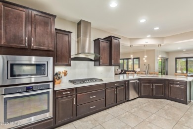Welcome to your dream home, nestled in a vibrant neighborhood on Poston Butte Golf Club in Arizona - for sale on GolfHomes.com, golf home, golf lot