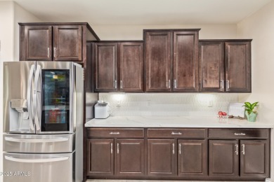 Welcome to your dream home, nestled in a vibrant neighborhood on Poston Butte Golf Club in Arizona - for sale on GolfHomes.com, golf home, golf lot