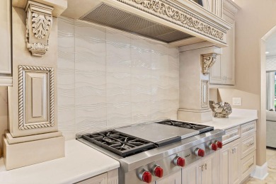 Exquisite turn-key Mediterranean style beach home located in the on Emerald Bay Golf Club in Florida - for sale on GolfHomes.com, golf home, golf lot