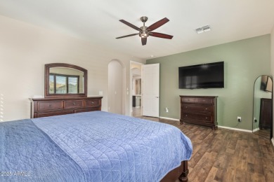 Welcome to your dream home, nestled in a vibrant neighborhood on Poston Butte Golf Club in Arizona - for sale on GolfHomes.com, golf home, golf lot