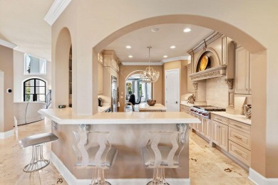 Exquisite turn-key Mediterranean style beach home located in the on Emerald Bay Golf Club in Florida - for sale on GolfHomes.com, golf home, golf lot