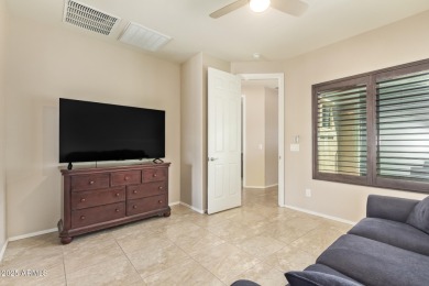 Welcome to your dream home, nestled in a vibrant neighborhood on Poston Butte Golf Club in Arizona - for sale on GolfHomes.com, golf home, golf lot