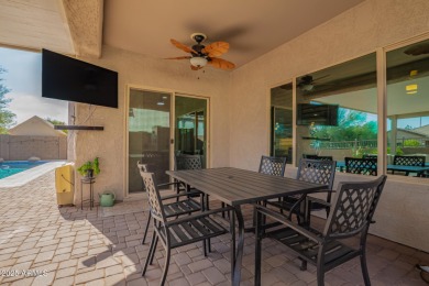 Welcome to your dream home, nestled in a vibrant neighborhood on Poston Butte Golf Club in Arizona - for sale on GolfHomes.com, golf home, golf lot