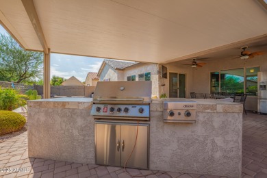 Welcome to your dream home, nestled in a vibrant neighborhood on Poston Butte Golf Club in Arizona - for sale on GolfHomes.com, golf home, golf lot