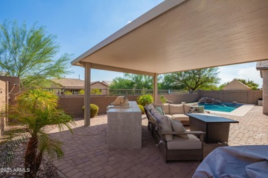 Welcome to your dream home, nestled in a vibrant neighborhood on Poston Butte Golf Club in Arizona - for sale on GolfHomes.com, golf home, golf lot