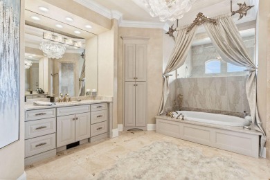 Exquisite turn-key Mediterranean style beach home located in the on Emerald Bay Golf Club in Florida - for sale on GolfHomes.com, golf home, golf lot