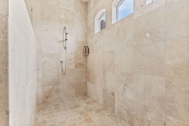 Exquisite turn-key Mediterranean style beach home located in the on Emerald Bay Golf Club in Florida - for sale on GolfHomes.com, golf home, golf lot