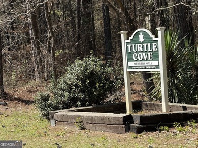 Discover an exceptional opportunity to build your dream on Turtle Cove Golf Course in Georgia - for sale on GolfHomes.com, golf home, golf lot