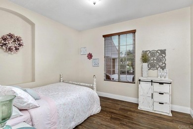 Nestled on a quiet cul-de-sac overlooking the Twin Oaks Golf on Twin Oaks Golf Course in California - for sale on GolfHomes.com, golf home, golf lot