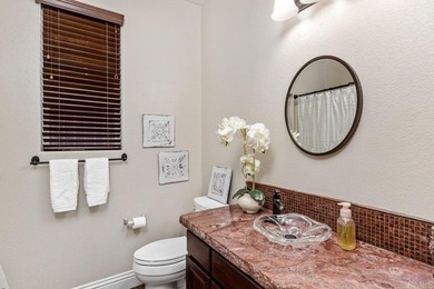 Nestled on a quiet cul-de-sac overlooking the Twin Oaks Golf on Twin Oaks Golf Course in California - for sale on GolfHomes.com, golf home, golf lot